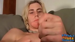 Striking long haired blond works on his rock solid cock